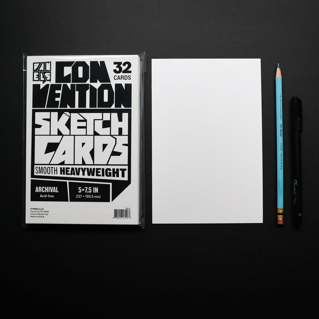 A package of Convection Sketch Cards shown next to a blank white card, a blue pencil, and a black pen on a black background.