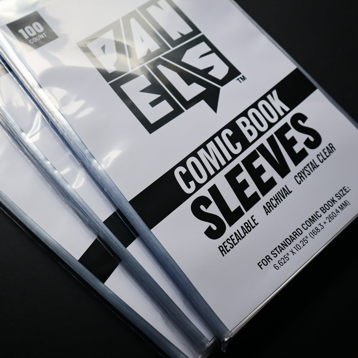 Pack of 100 RANELS Comic Book Sleeves in a clear plastic bag, displayed diagonally on a dark background.
